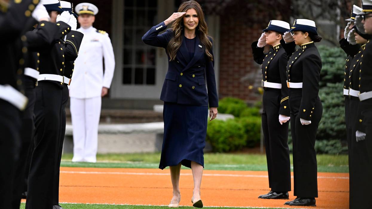 Homeland Security Secretary Kristi Noem salutes as she arrives at the commencement for the United States Coast Guard Academy, Wednesday, May 21, 2025 in New London, Conn.