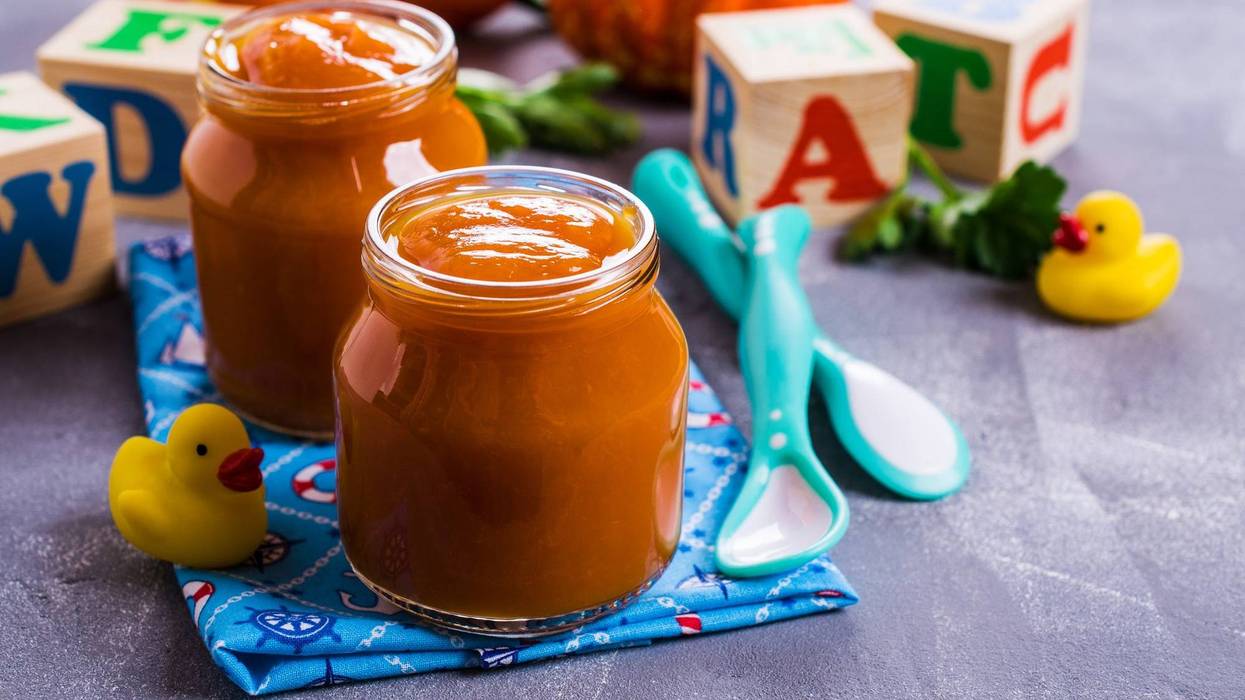 Homemade baby food from pumpkin and carrots. Selective focus.