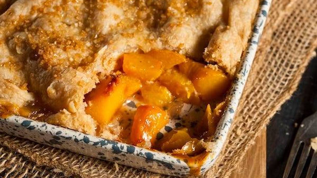 Homemade peach cobbler in a dish