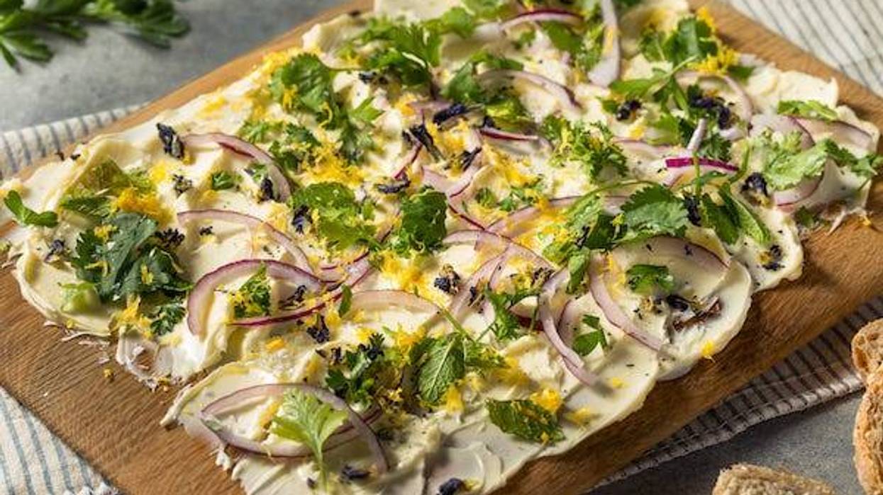 Homemade Trendy Butter Board with Herbs and Bread