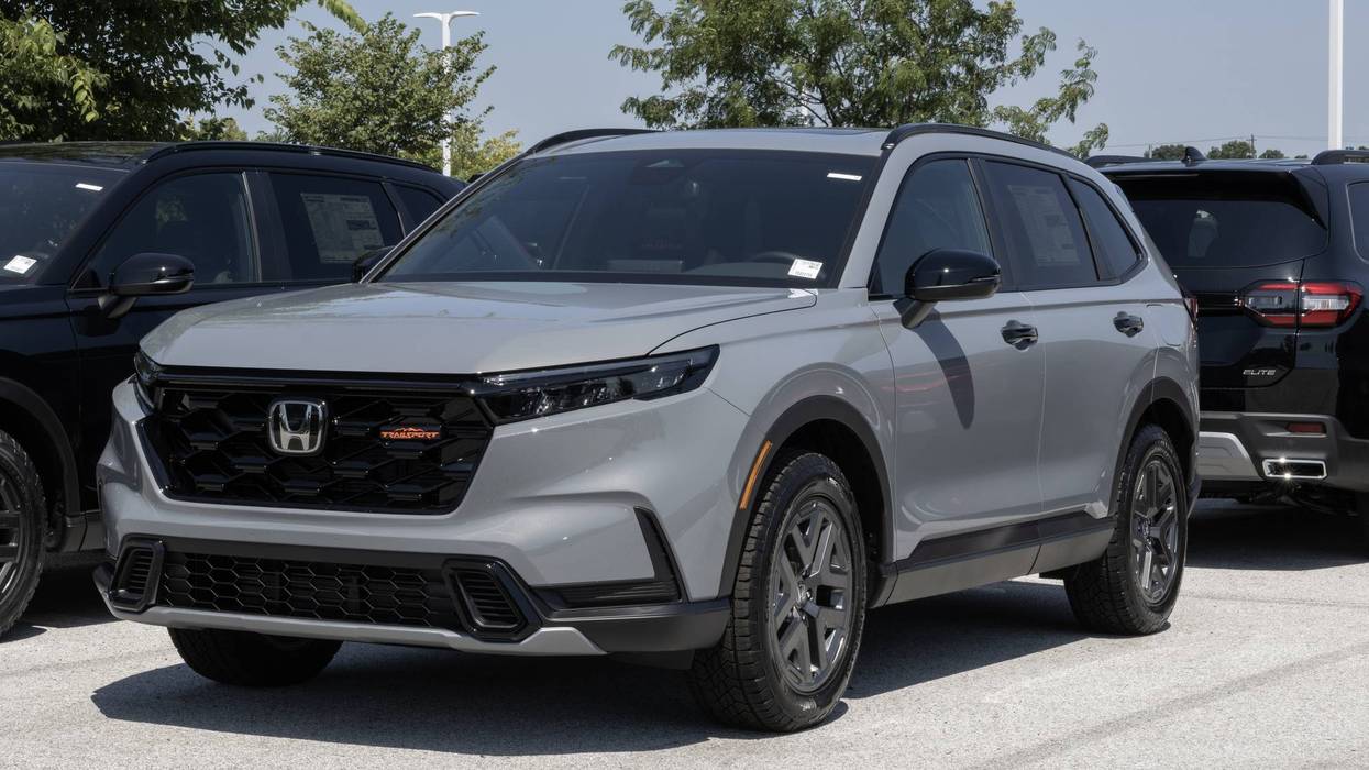Honda CR-V Hybrid AWD TrailSport compact SUV display at a dealership. Honda offers the CRV with a 2.0L Hybrid engine. MY:2026