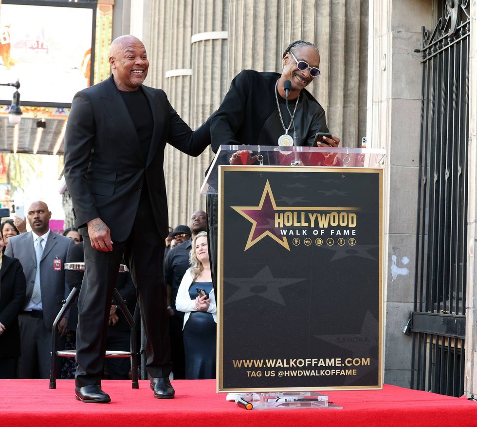 Honoree Dr. Dre and Snoop Dogg speak during the Hollywood Walk of Fame Star Ceremony for Dr. Dre