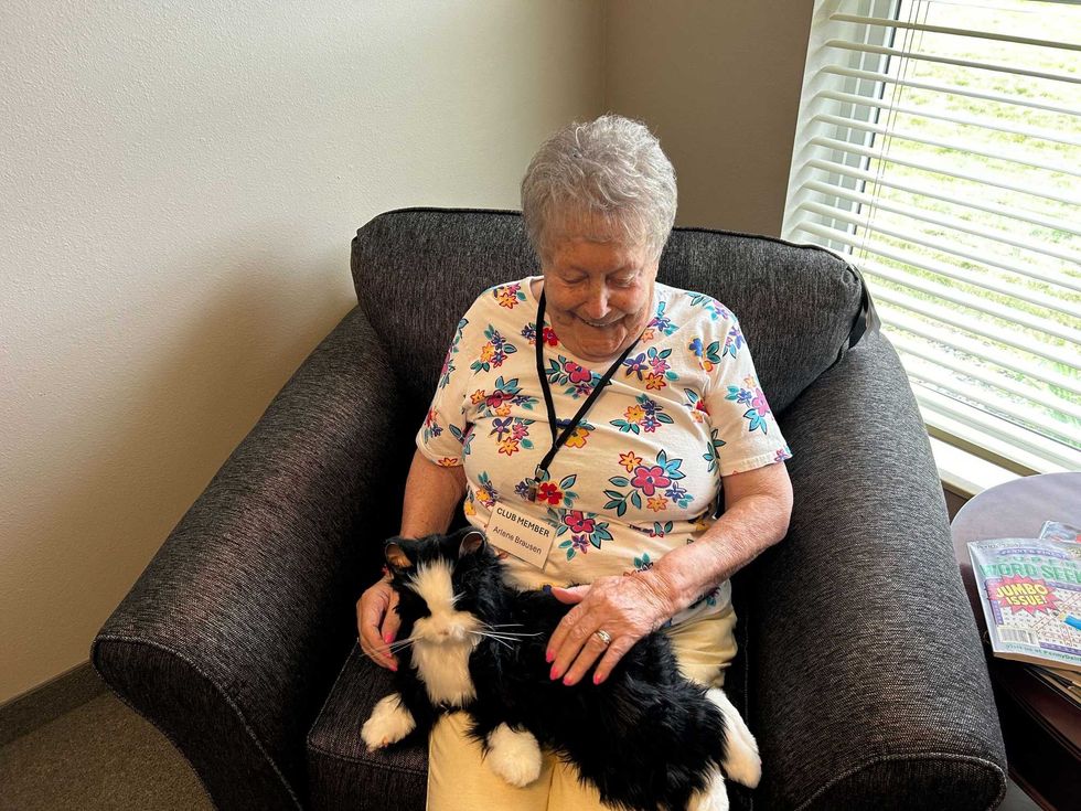 Horizon Health resident Arlene Brausen with her robo-cat Friskie.
