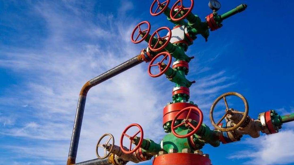 Horizontal view of a wellhead with valve armature. Oil and gas industry concept