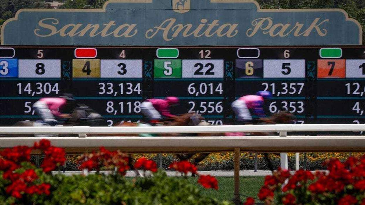 Horses finish the the first race during the last day of the winter/spring meet at the Santa Anita horse racing track Sunday, June 23, 2019, in Santa Anita, Calif.