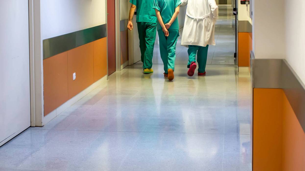 Hospital employees in a hallway
