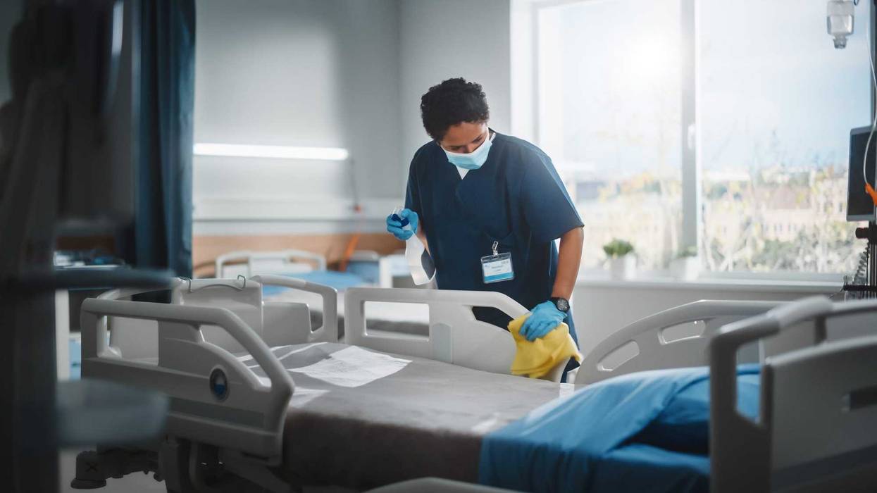 hospital room with worker