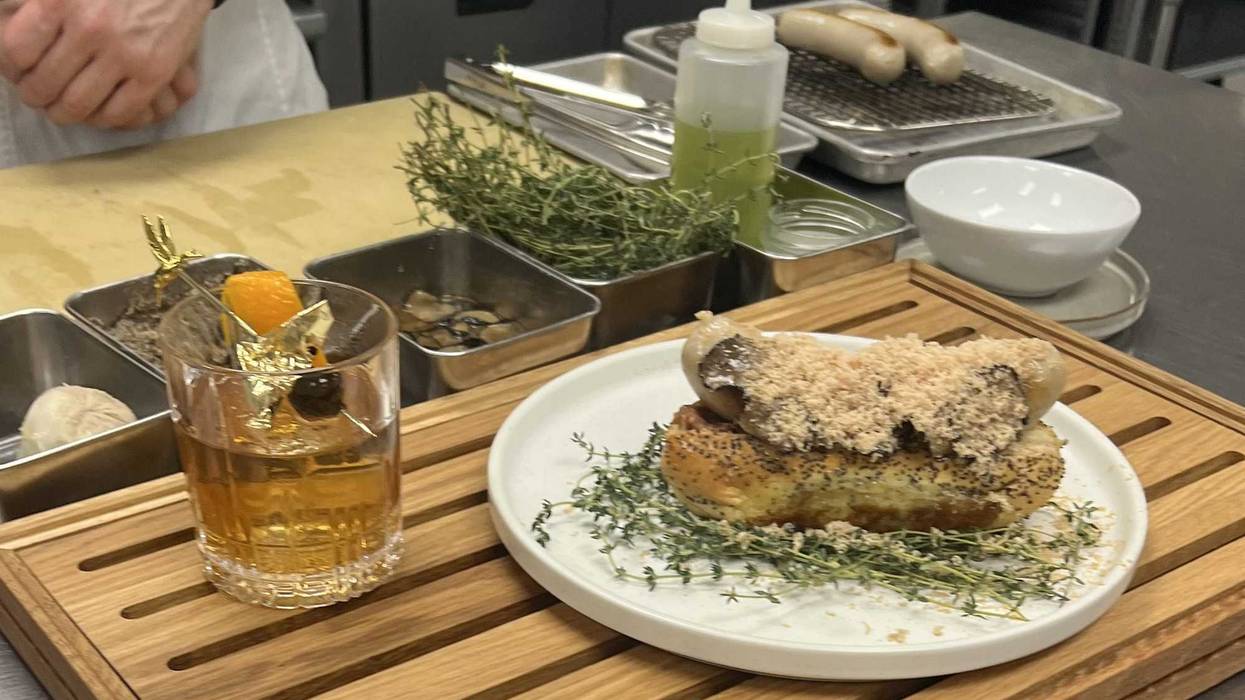 hot dog and cocktail on tray