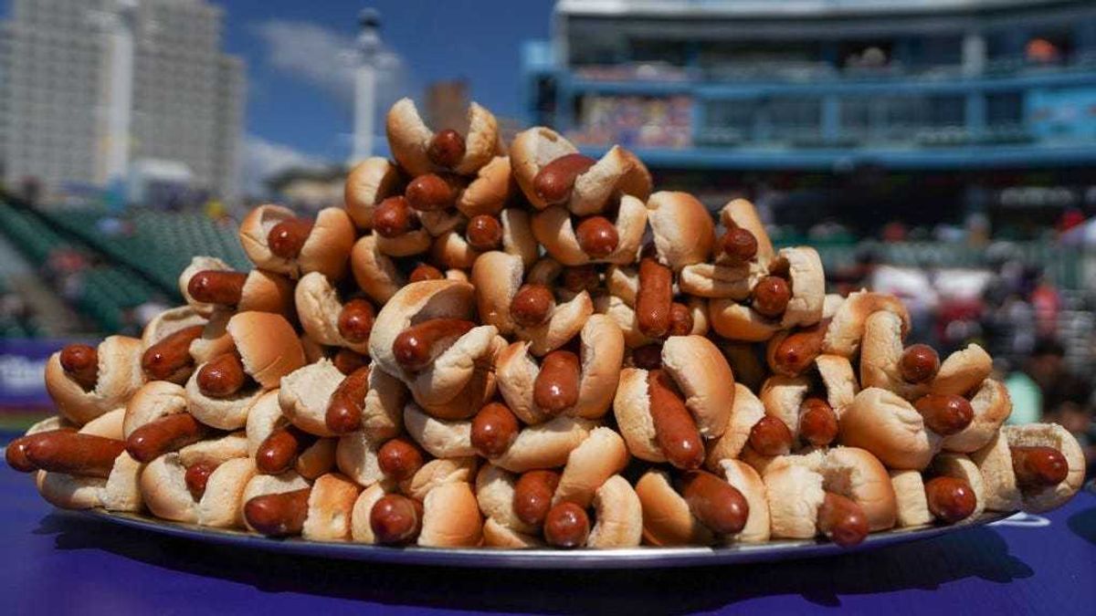 Hot dogs are prepared for the 2021 Nathan's Famous 4th Of July International Hot Dog Eating Contest on July 4, 2021 in New York City.