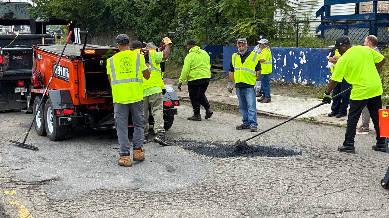 Hot patch road work