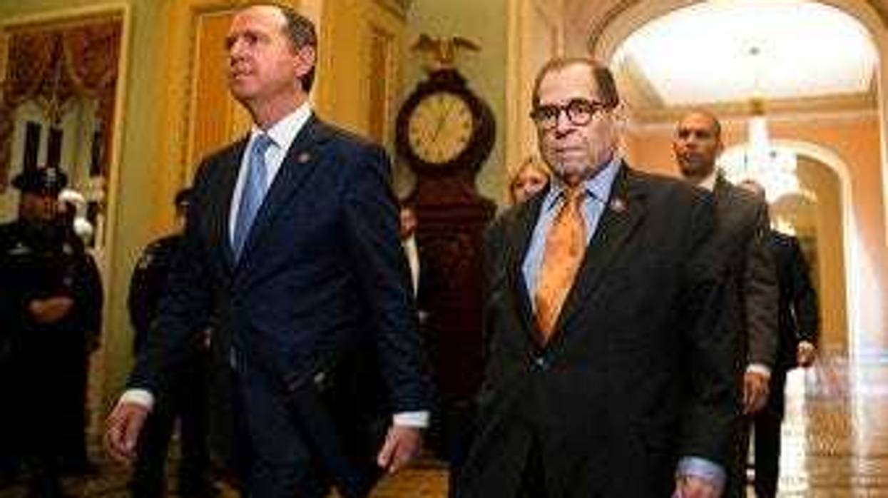 House Intelligence Committee Chairman Adam Schiff, D-Calif., front left, and House Judiciary Committee Chairman, Rep. Jerrold Nadler, D-N.Y., and other House impeachment managers, walk to the Senate chamber. (AP Photo/Matt Rourke)