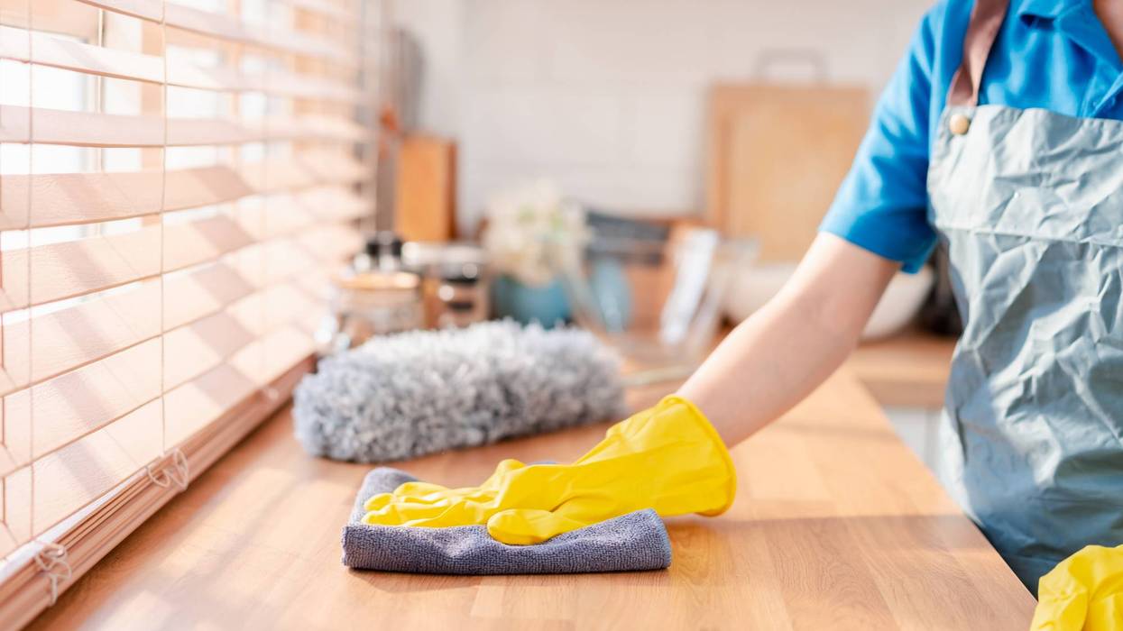 Housework or house keeping service female cleaning dust in house, cleaning agency small business. professional equipment cleaning old home.