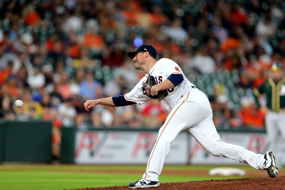 Houston Astros relief pitcher Joe Smith (38) throws a pitch against the Oakland Athletics during the ninth inning at Minute Maid Park.