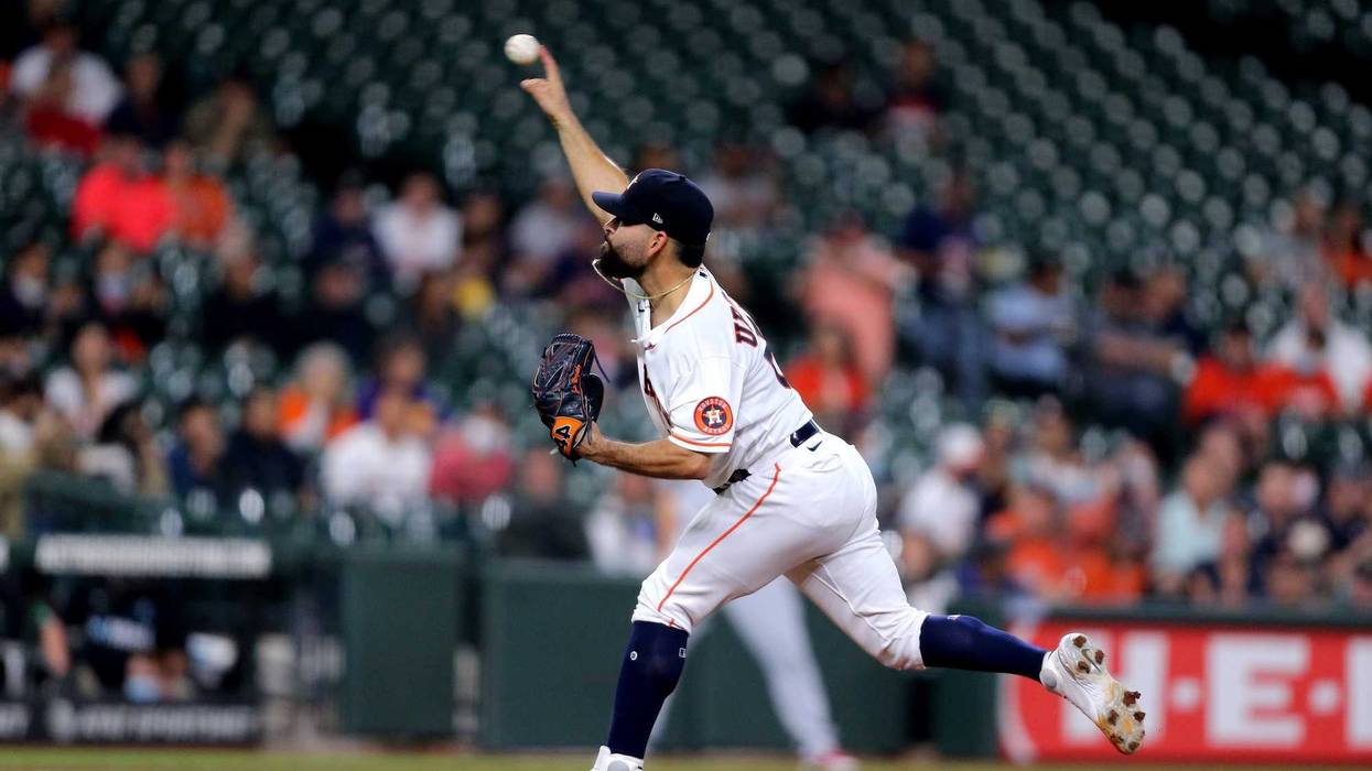 Houston Astros starting pitcher Jose Urquidy (65) pitches against the Los Angeles Angels during the first inning at Minute Maid Park.