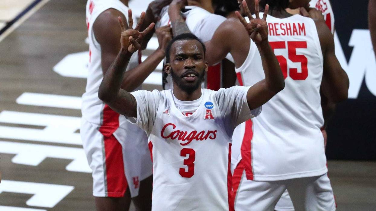 Houston Cougars guard DeJon Jarreau (3) celebrates fter the game against the Oregon State Beavers in the Elite Eight of the 2021 NCAA Tournament at Lucas Oil Stadium.