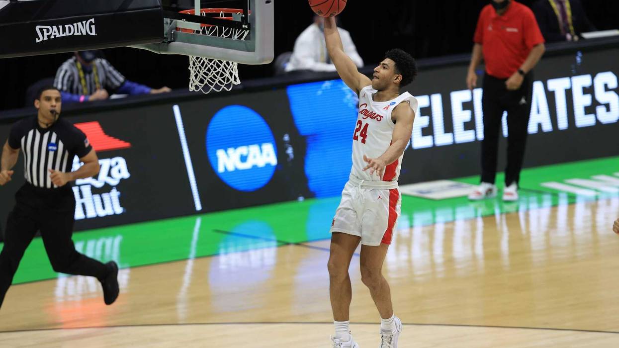 Houston Cougars guard Quentin Grimes (24) goes up for a shot during the second half in the second round of the 2021 NCAA Tournament against the Rutgers Scarlet Knights at Lucas Oil Stadium.