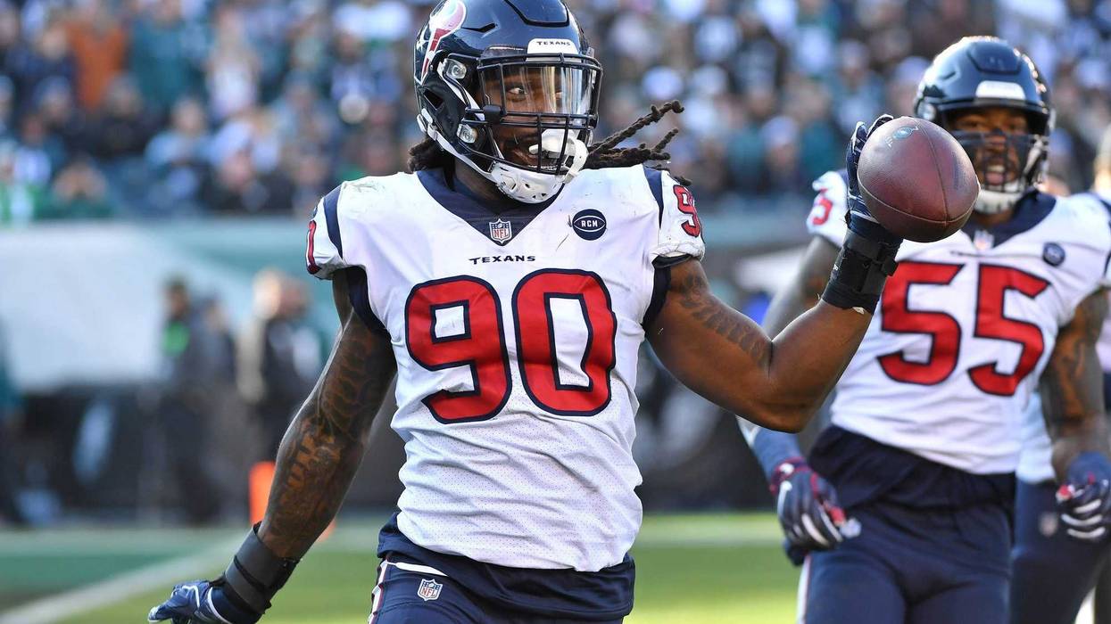 Houston Texans outside linebacker Jadeveon Clowney (90) celebrates after recovering fumble against the Philadelphia Eagles during the second quarter at Lincoln Financial Field.