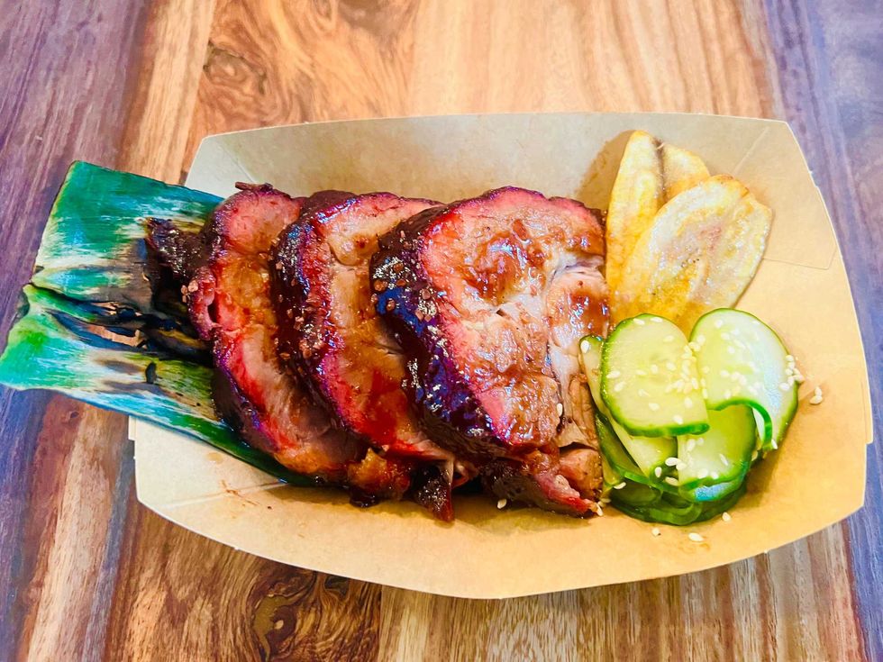 Hula Kalua Pork, slow-smoked pork collar caramelized with Hawaiian barbecue sauce, inspired by the flavors of traditional Hawaiian Kalua pork from RC