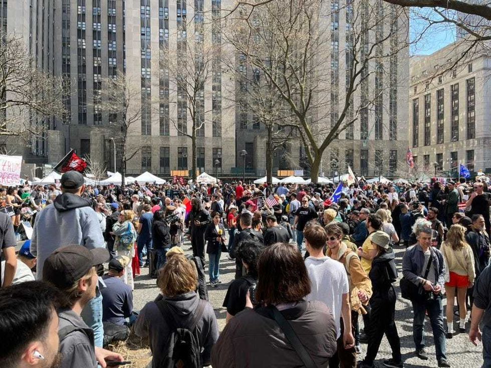 Hundreds gather at Collect Pond Park near the courthouse ahead of former President Donald Trump