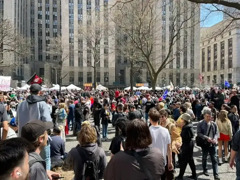 Hundreds gather at Collect Pond Park near the courthouse ahead of former President Donald Trump