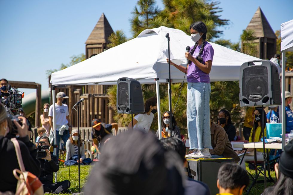 Hundreds of people rally in Berkeley, to show support for the Asian American community.