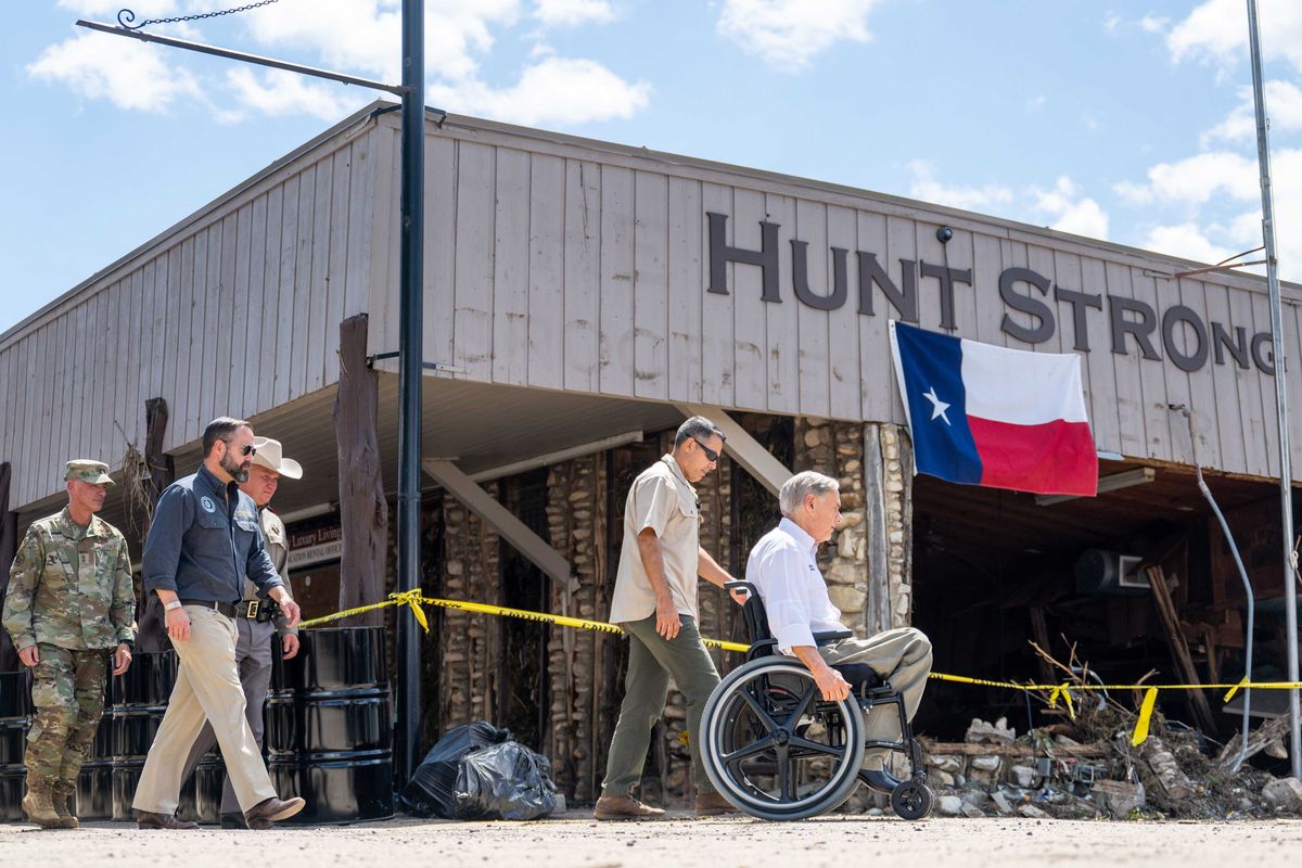 HUNT, TEXAS - JULY 08: Gov. Greg Abbott arrives at a news conference on July 08, 2025 in Hunt, Texas. Gov. Abbott announced more than 160 people still missing after deadly floods early Friday. Last week, heavy rainfall caused severe flash flooding along the Guadalupe River in central Texas, leaving more than 100 people reported dead, including children attending Camp Mystic. (Photo by Brandon Bell/Getty Images)