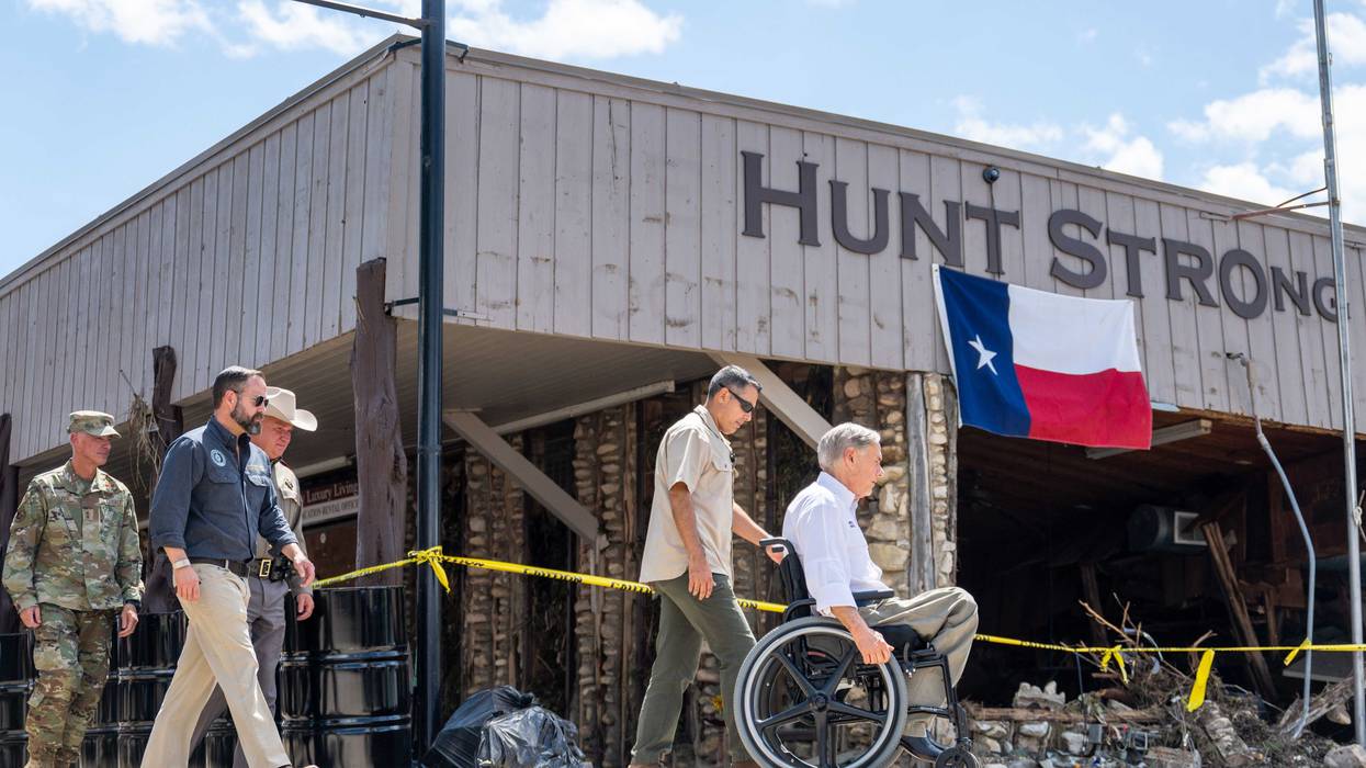 HUNT, TEXAS - JULY 08: Gov. Greg Abbott arrives at a news conference on July 08, 2025 in Hunt, Texas. Gov. Abbott announced more than 160 people still missing after deadly floods early Friday. Last week, heavy rainfall caused severe flash flooding along the Guadalupe River in central Texas, leaving more than 100 people reported dead, including children attending Camp Mystic. (Photo by Brandon Bell/Getty Images)