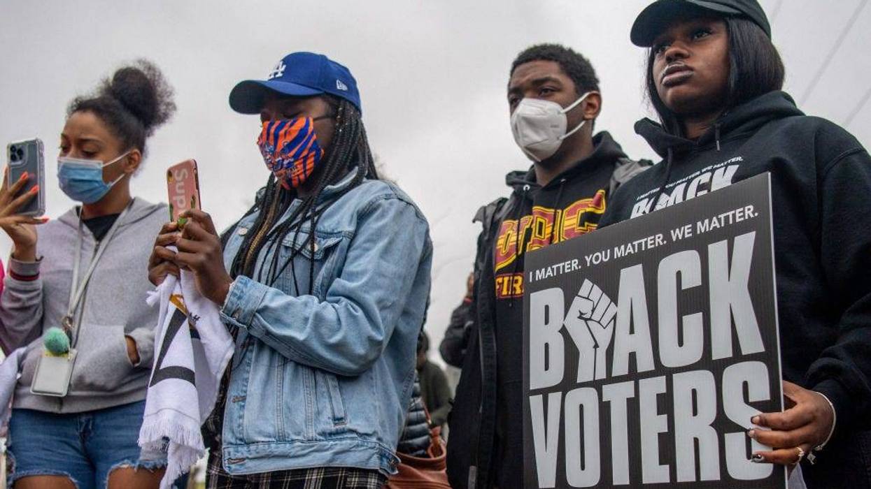 I'munique, 18, (R), listens during the Black Voters Matter's 57th Selma to Montgomery March at the Wright Chapel AME Church on March 09, 2022 in Selma, Alabama. People gathered alongside organizations including Black Voters Matter, Rainbow PUSH Coalition, and the Transformative Justice Network to march the 11-mile original route that the late U.S. Rep. John Lewis and other civil rights leaders marched on March 7, 1965. In 1965, the march began at the the Edmund Pettus Bridge and was met with brutal beatings of civil rights marchers at the hands of law enforcement. The march would later become known as "Bloody Sunday". The televised attacks were seen all over the nation, prompting public support for the civil rights activists in Selma and for the voting rights campaign. (Photo by Brandon Bell/Getty Images)