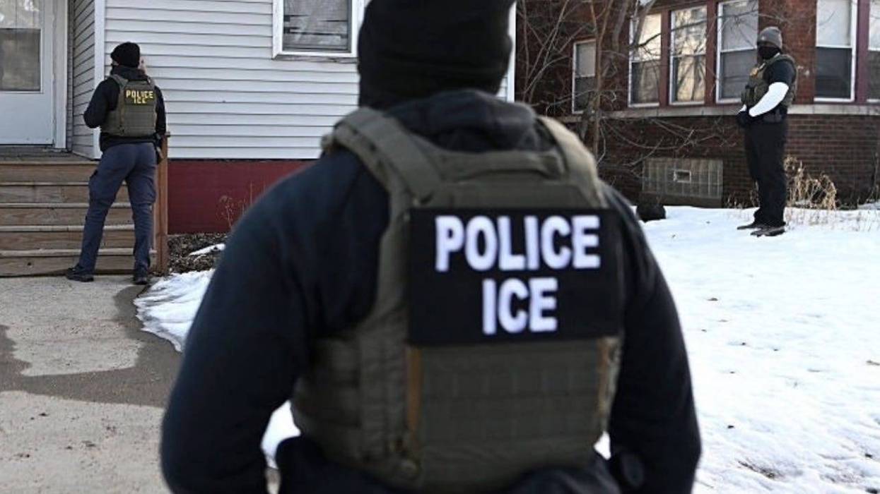 ICE agents approach house in Minneapolis, MN.