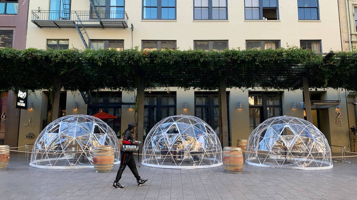Igloo-like plastic dining bubbles line San Francisco's Mint Plaza outside sushi eatery Hashiri.