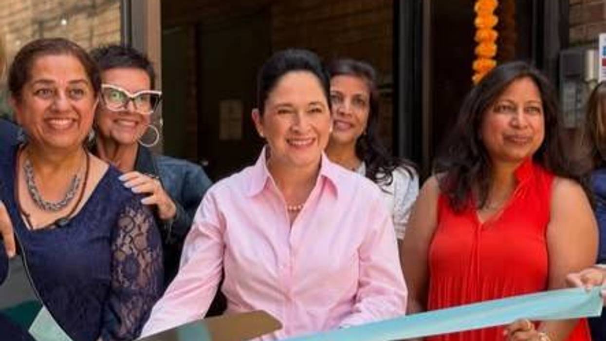 Illinois Comptroller and candidate for mayor Susana Mendoza (center).