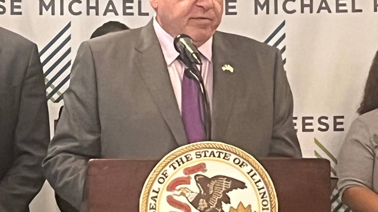 Illinois Gov. J.B. Pritzker answers reporters' questions during an event at the Michael Reese Health Trust in the Loop.