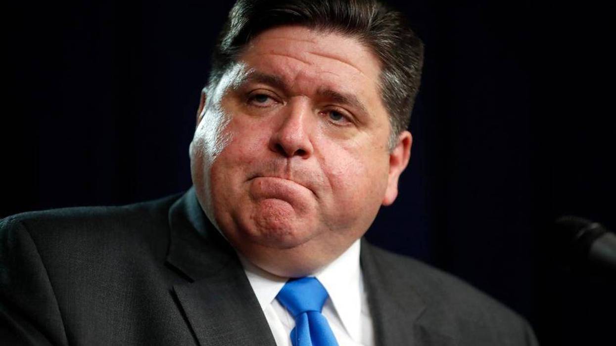 Illinois Gov. J.B. Pritzker listens to a question after announcing a shelter in place order to combat the spread of the Covid-19 virus, during a news conference Friday, March 20, 2020, in Chicago.