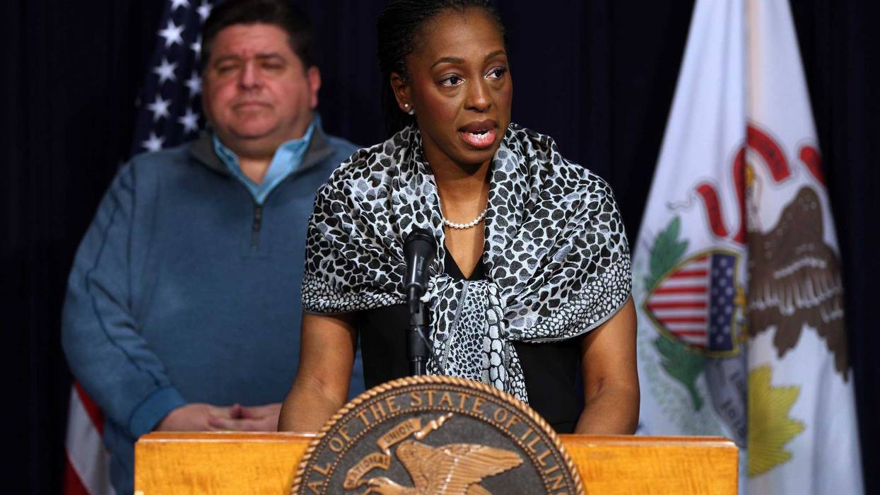 Illinois Governor J.B. Pritzker, left, and Dr. Ngozi Ezike, of the Illinois Department of Public Health