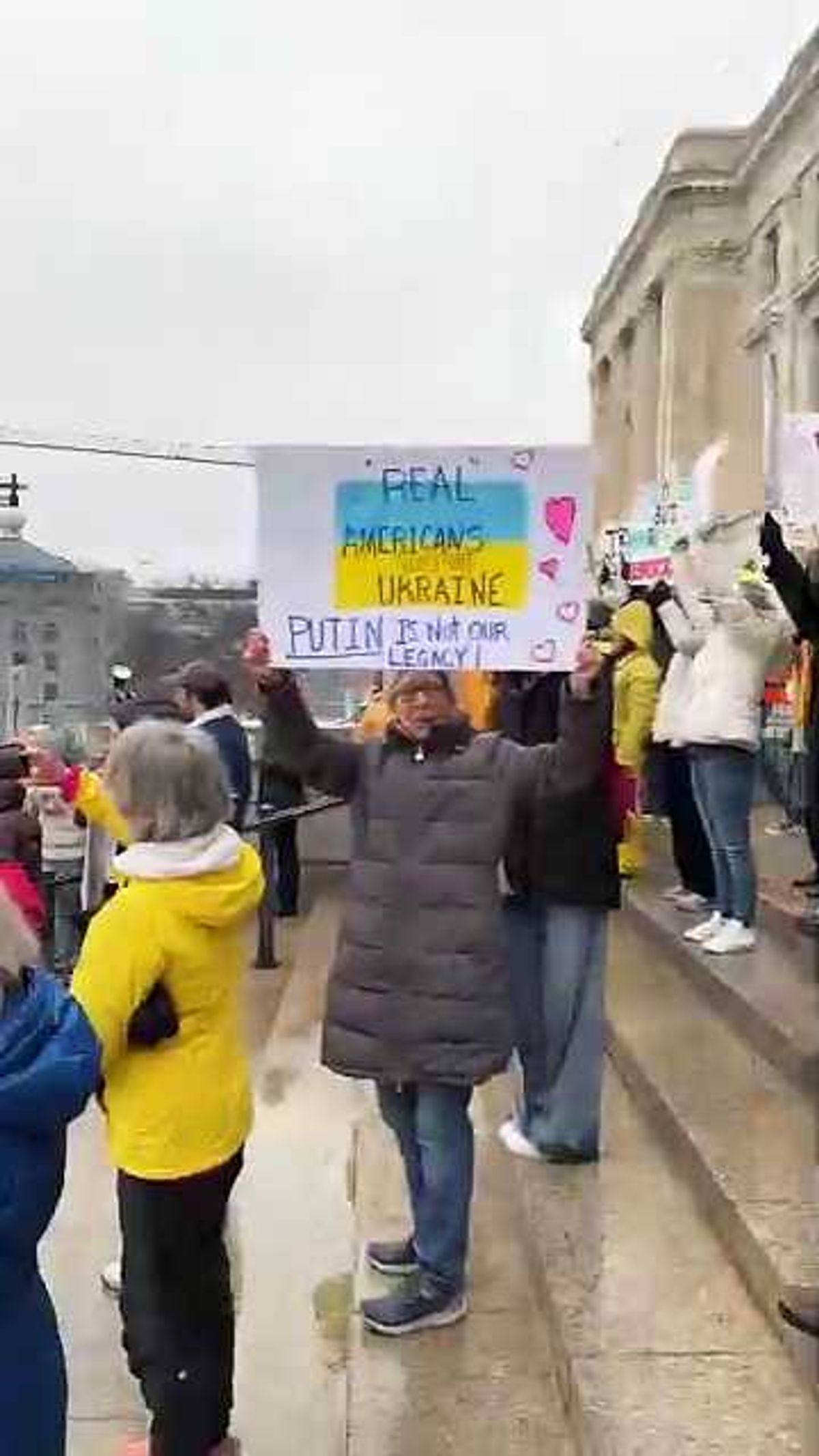 Protestors gather in St. Paul upset at the Trump administration and Elon Musk over government cuts, tariffs and Ukraine