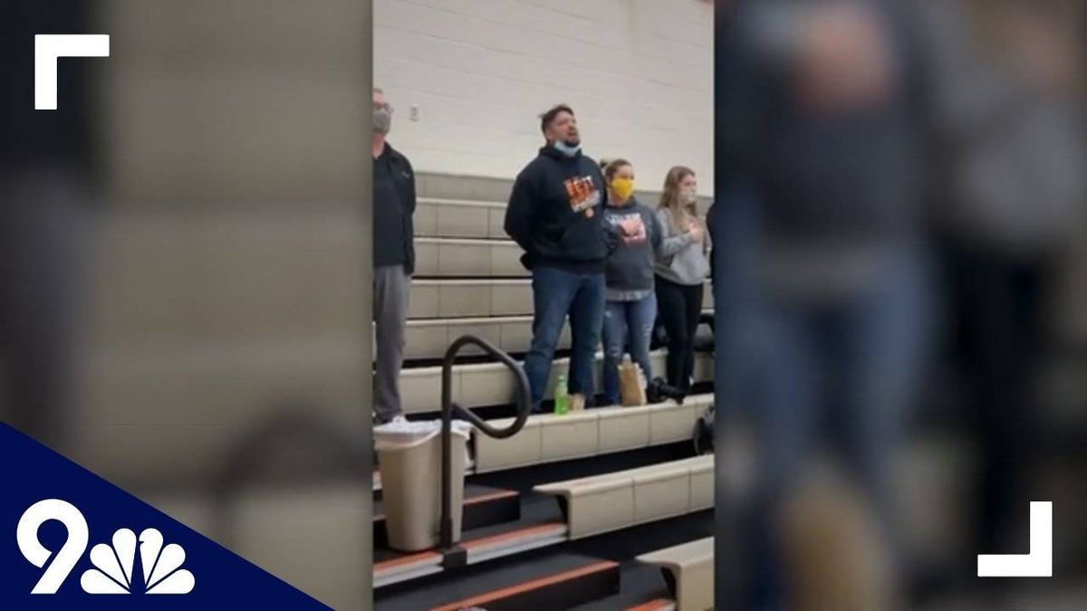 WATCH: Dad steps in to belt out National Anthem at son's basketball game and audience is speechless