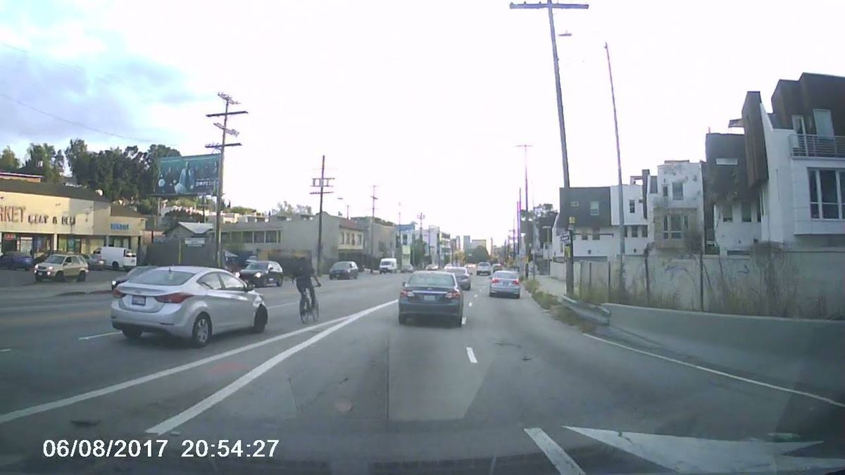 WATCH: Bicyclist barely escapes with life after hit-and-run driver crushes bike