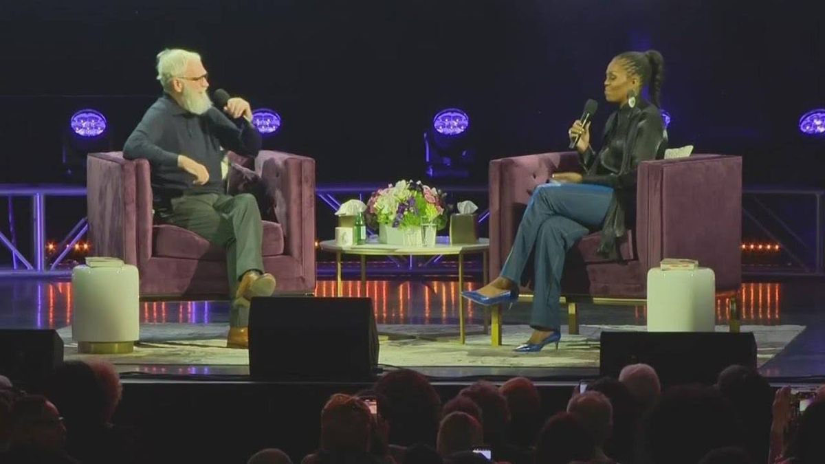 Michelle Obama reveals vulnerabilities while promoting new book in stop at hometown