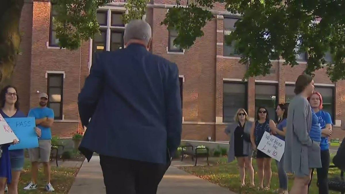 Wheaton Warrenville parents protest outside of school board meeting