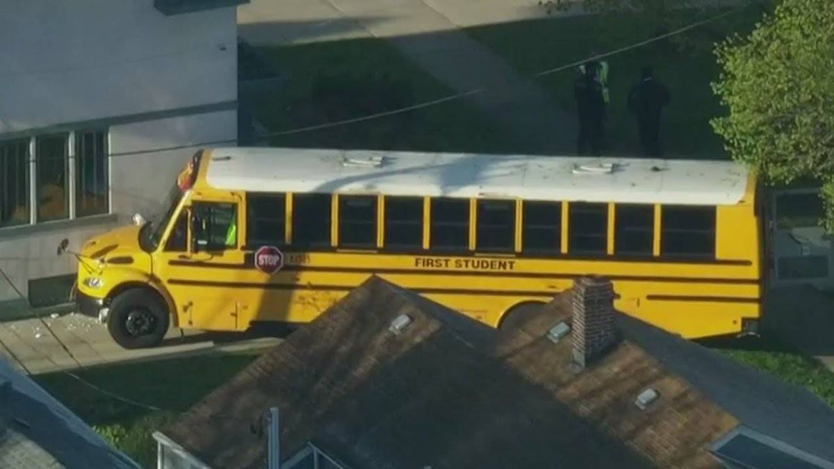 School bus crashes into Western Springs home