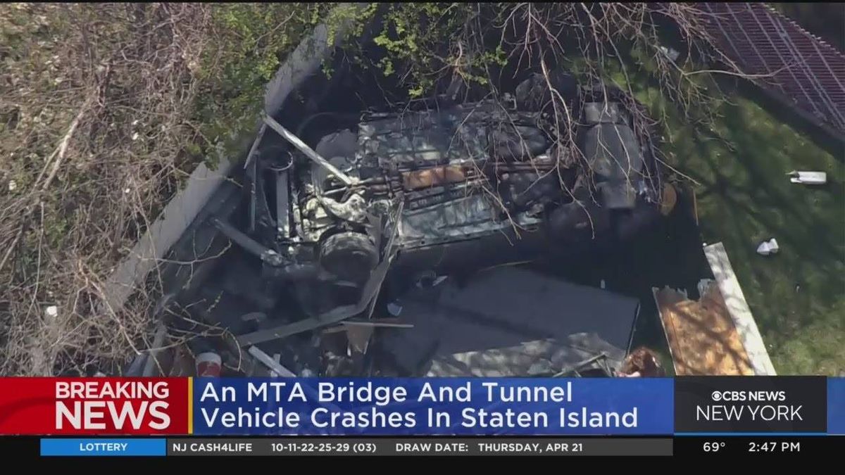MTA officer injured after car rolls over into Staten Island backyard