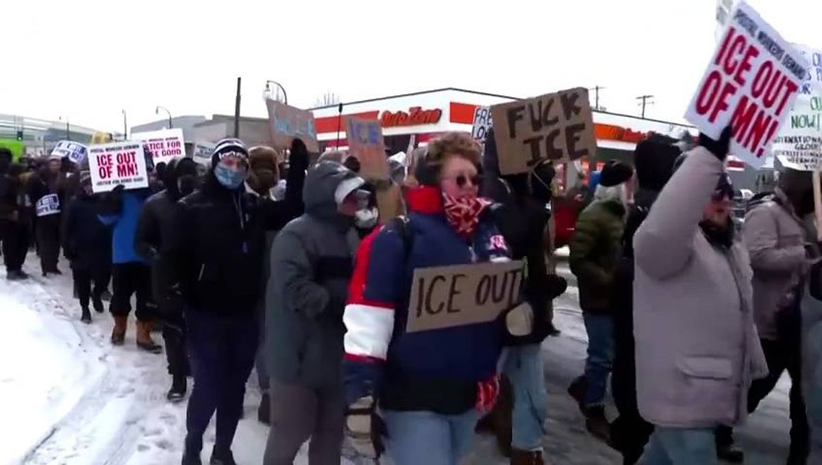 Police arrest protesters at airport as more anti-immigration enforcement protestors gather in downtown Minneapolis