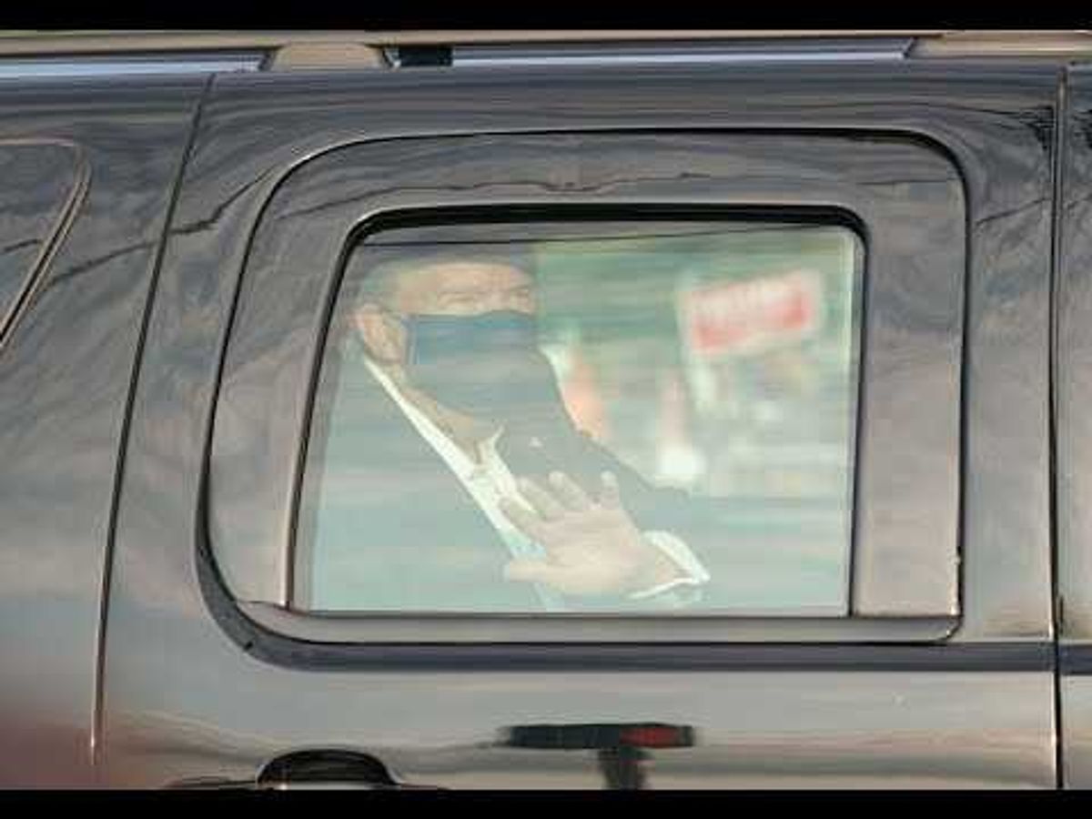 Trump appears briefly in 'surprise visit' outside hospital, doctors say he may be discharged as soon as Monday