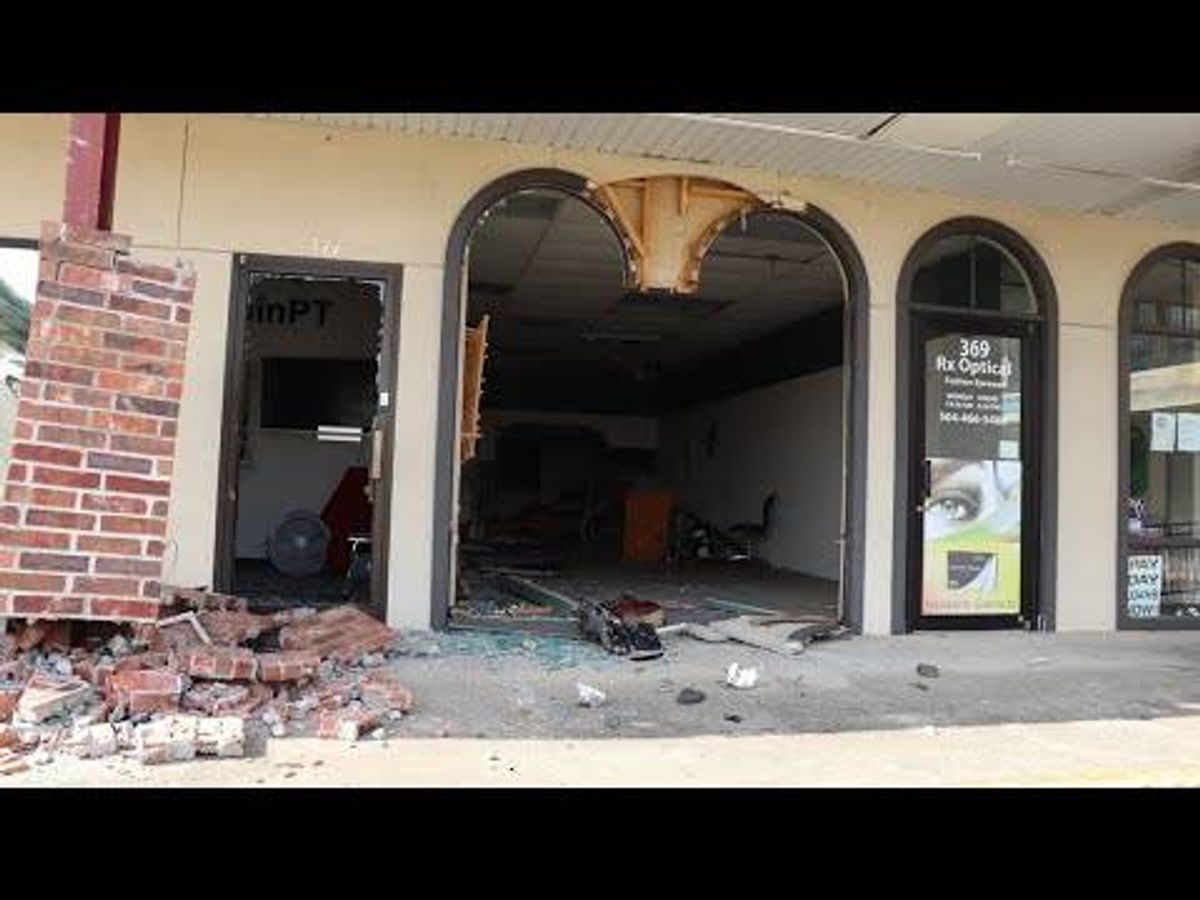 Video shows car crashing into Kenner strip mall, speeding away
