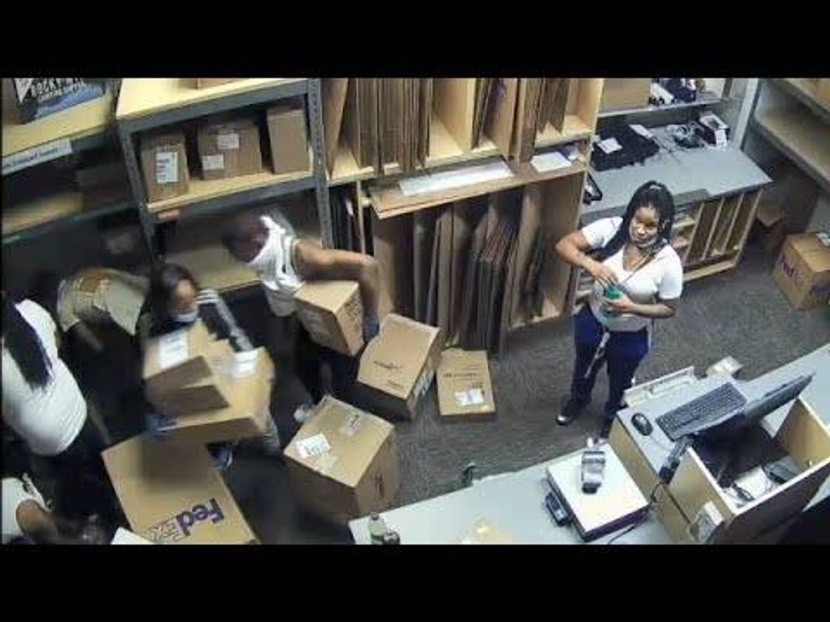 Police share video of people looting downtown FedEx store