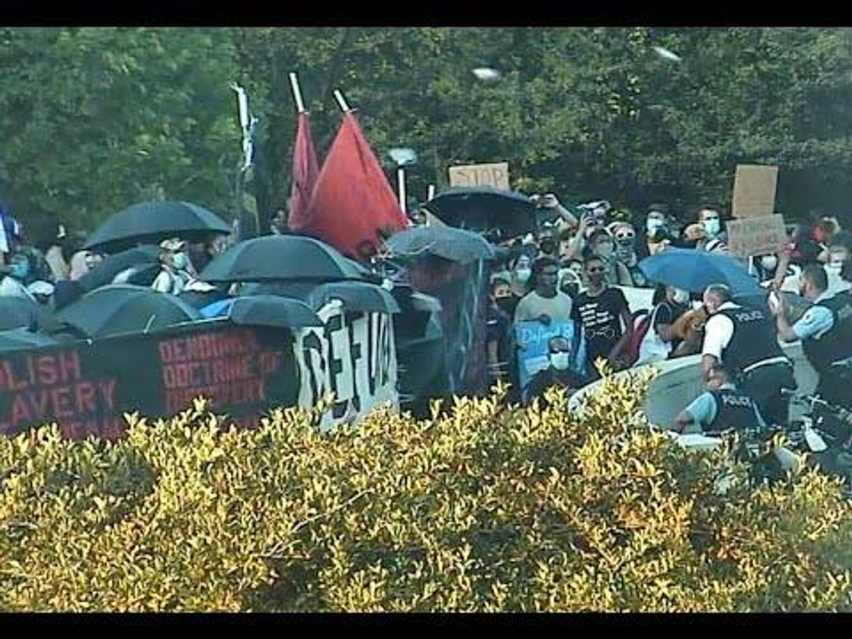 Police seek 14 wanted for 'mob action' at Columbus statue protest last summer