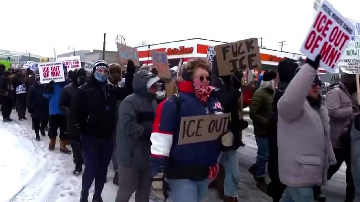 Police arrest protesters at airport as more anti-immigration enforcement protestors gather in downtown Minneapolis