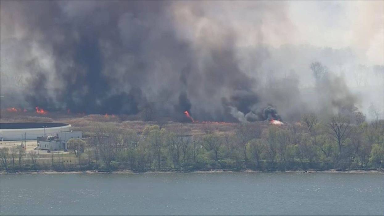 Crews battle 'extremely large' wildfire in West Deptford Township