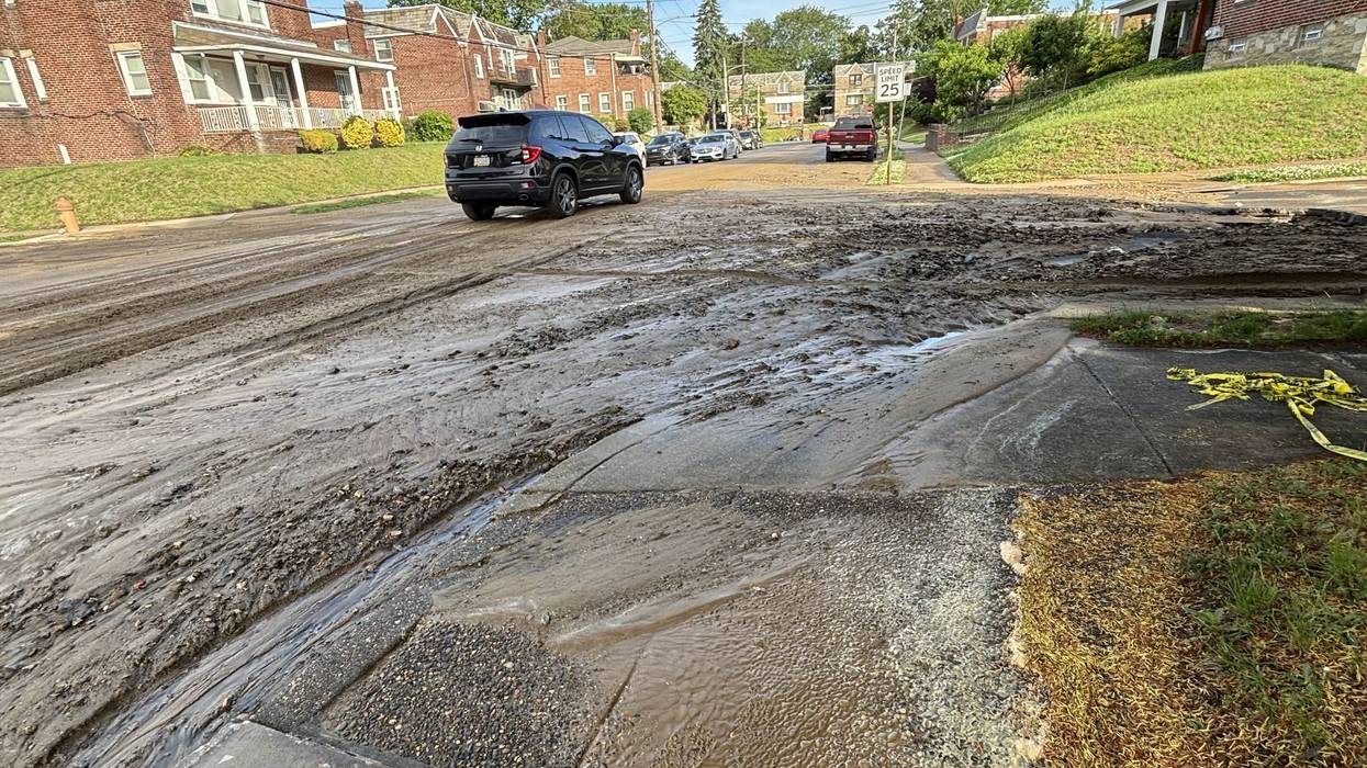 Water main break creates muddy mess on residential East Mount Airy street