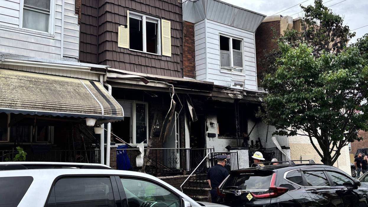 Woman killed, child injured in South Philadelphia row home fire